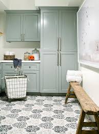 A typical laundry room is located in the basement of older homes, but in many modern homes, the laundry room might be found on the main floor near the kitchen or upstairs near the bedrooms. Rustic Laundry Room Cabinets Design Ideas