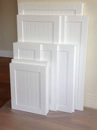 Shaker Style Cabinet With Beadboard Accent Beadboardkitchencabinets White Kitchen Cabinet Doors Beadboard Kitchen Refacing Kitchen Cabinets