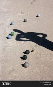 This bocce court makes good use of a long and narrow side yard. Balls Man Shadow On Image Photo Free Trial Bigstock