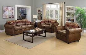 Sunken living room offers a fireplace and large picture windows. The Living Room Missoula Mt