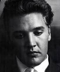 Elvis remained by his mother's casket for hours, unable to face the reality  of her passing. They eventually placed a glass cover over her because he  couldn't stop reaching out, gently touching