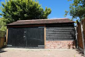 Building a garage averages $50 per square foot. Brick And Timber Garage Build Old England Buildings