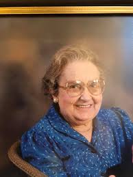 My wife Barbara Skivington (was Thomas) holdinhg the cross in Christ Church  don't know who the other people are