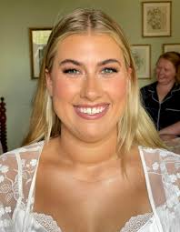 Makeup by Brooke Duvall added a...