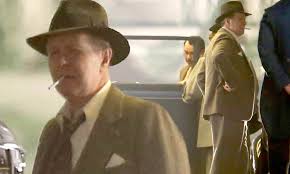 1930's hollywood is reevaluated through the eyes of scathing social critic and alcoholic screenwriter herman title: Mank First Look Gary Oldman Looks Dapper While Filming Scenes For Upcoming Netflix Movie Daily Mail Online