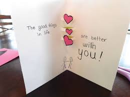 Glue the inner piece of the pop up card to the colorful outside portion, allowing the tabs to pop out and fold when the card is folded. Make A Pop Up Valentine S Day Card In 6 Easy Steps Dailytrib Com