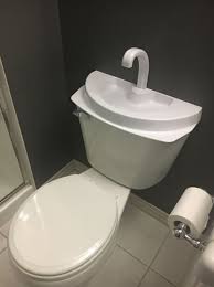 Sink Again The Water Saving Tank Lid By Sinktwice Is A Great Water Saving Gadget And It Pays For Itself Too The Company Ha Small Bathroom Toilet Tank Sink