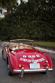 Pin By Style Me Pretty On Si Lo Voglio 1 Poppy Red Wedding Wedding Getaway Car Wedding Car