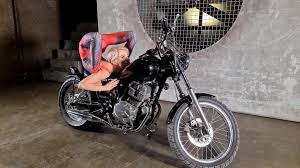 Contortionist alesya on a motorcycle
