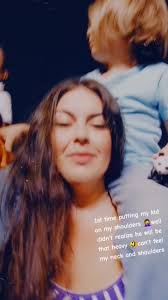 Mother Carrying Her Son