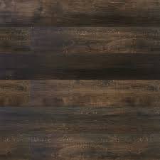 Luxury vinyl plank flooring (lvp) or tile (lvt) is essentially vinyl flooring in pieces instead of one huge sheet like linoleum. Home Decorators Collection 5 Mm Waterproof Rustic Coal 7 Inch X 48 Inch Rigid Core Luxury The Home Depot Canada