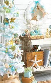 Shells, starfish, coral, sprigs of real garland etc. Beach Christmas Decorations Ideas Inspired By Sea Sand Shells Beach Bliss Living