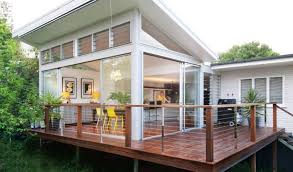 building an extension to your home can be a great way to get the space you want without having the expenses and house on stilts house exterior house with porch