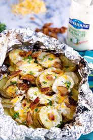 Bacon Ranch Grilled Potatoes Sliced Potatoes Flavored With Real Ranch Dressing Bacon And Cheese For Foil Packet Meals Camp Cooking Recipes Grilling Recipes