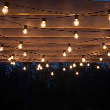 Install a hook into each tree at the marked spot. Hanging Lights For Patio Design And Style