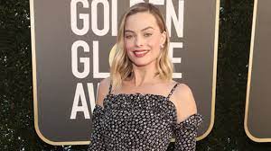 She's been at this game a good while now. Margot Robbie S 2021 Golden Globes Look See Her Chanel Outfit Now Stylecaster