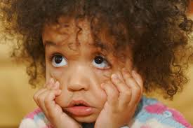 Cute African American Mixed Race Girl Making A Funny Face