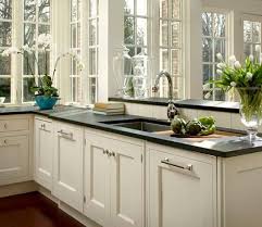 White cabinets modern kitchen black granite countertops. Black Granite Countertops Styles Tips Video Infographic