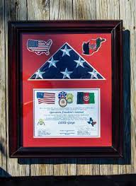 This flag has three stripes of the colors black, red, and green. Operation Freedom S Sentinel Flag Dedication Little Guys Movers