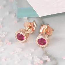 Read about the traditional birthstones at howstuffworks. Ruby July Birthstone Rose Gold Earrings By Embers Notonthehighstreet Com