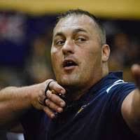 Retired U.S. Army Sgt. Sean Hook (right) celebrates