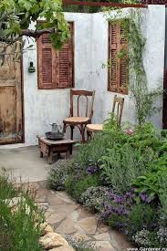 Pin By Nadia Woodley On Outdoor Wall Ideas Small Courtyard Gardens French Country Garden Backyard