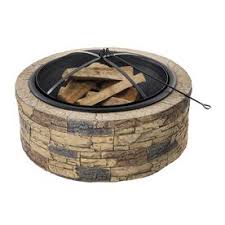 No issues with the wind. Sun Joe 35 In W Brown Stone Wood Burning Fire Pit Lowes Com Stone Fire Pit Fire Pit Wood Burning Fire Pit