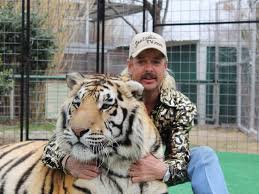 Exotic joe's voice was from another world! Tiger King Joe Exotic Regrets Keeping Wild Animals In Cages Now He S Behind Bars Himself Mirror Online