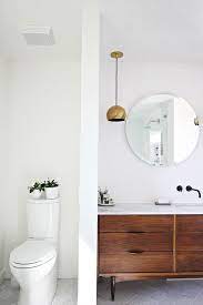 Mid century modern vanity mid century bathroom floating cabinets wood cabinets interior architecture interior design glass partition beautiful bathrooms modern bathrooms. 1000 Ideas About Walnut Cabinets On Pinterest Milo Baughman Mid Century Modern Bathroom Modern Bathroom Bathroom Inspiration