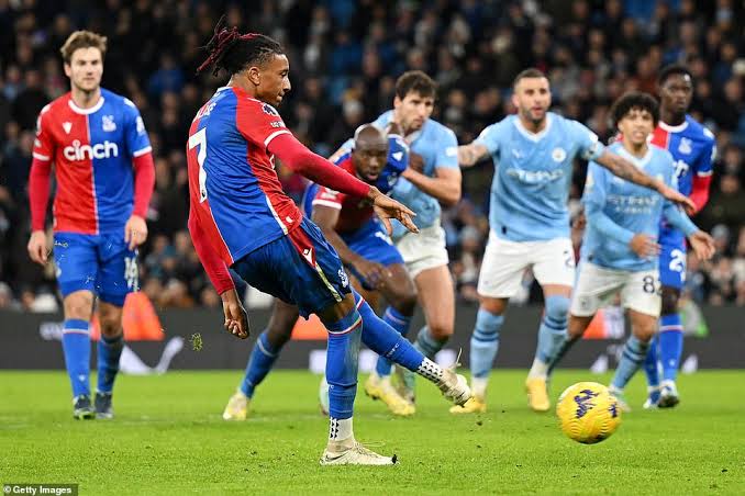Man City 2-2 Crystal Palace: Michael Olise scores injury time penalty as Eagles stage stunning fightback to dent Pep Guardiola's side in the title race | Daily Mail Online