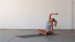 Sit in dandasana (staff pose), then lean your torso back slightly on your hands and lift and open your legs to an angle of about 90 degrees (the legs should form an approximate right angle, with the pubis at the apex). Seated Sidebend Yoga 15