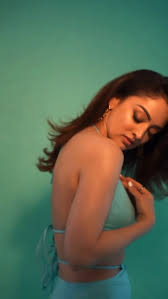 Sandeepa Dhar flaunts her sexy back in skimpy string top with high slit  skirt - watch video and pics. - SpideyPosts