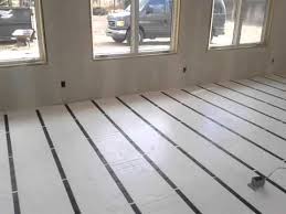 Insofast Panels Provide A Simple Easy Way To Insulate Cold Concrete Floors The Attachment Studs Provide A Secure Surf Concrete Floors Flooring Garage Remodel