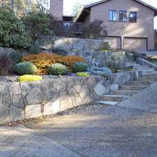 Spaced every 6 to 8 feet, it lets water drain through the wall base Recycled Concrete Retaining Walls Concrete Retaining Walls Retaining Wall Recycled Concrete