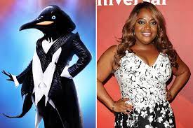 The masked singer season 2 is finally here, and fans are dying to find out which celebrities are showing off their singing chops on the show. Masked Singer Penguin And Black Widow Revealed People Com