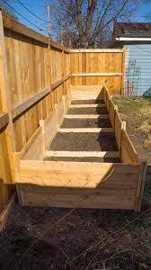 Raised Bed Against A Fence Google Search Building Raised Garden Beds Building A Raised Garden Fenced Garden Design