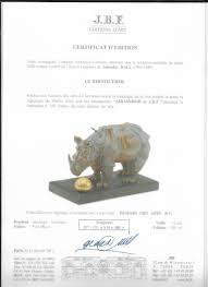 Sculpture en bronze selon la technique de la cire perdue, avec patine verte. Salvador Dali Two Rhinoceros Bookends At 1stdibs