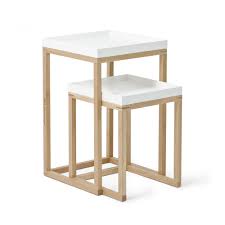 The steel tops are coloured in white and the lacquered solid oak legs provide elegant support. Wireworks Nest Of 2 Side Tables White Oak Black By Design