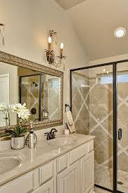 Gehan Homes Cream Granite Brushed Gold Mirror Tile Design Candelabra Light F Trendy Bathroom Tiles Bathroom Remodel Designs Light Fixtures Bathroom Vanity