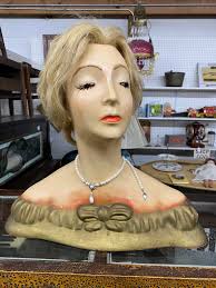 So I went to my local antique store (Yellow Moon Antiques) and I walked out  with a broach and a scarf but I can't stop thinking about this strand of  human hair