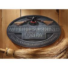 Start off by adorning your door with a witch hat and broom entrance. Witch Decorations For Halloween Room Props