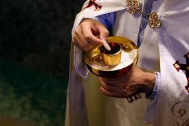 Is sipping from the Communion cup a hazard to your health? | National  Catholic Reporter