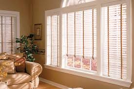 We offer custom window treatments including custom blinds, custom window shutters, custom cellular shades, custom roller shades, woven woods, faux and wood blinds and patio covers. Wood Blinds Specialty Window Coverings Portland Or