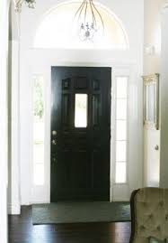 But removing the screen door and spackling & painting the trim wasn't the only prep task we took on. Black Interior Front Door Juniper Home