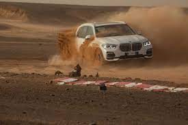 The Iconic Bends Of Monza Traced In The Ancient Sand Of The Sahara The New Bmw X5 Challenges The Rugged Desert Of Morocco The Monza Bmw Bmw X5 New Bmw