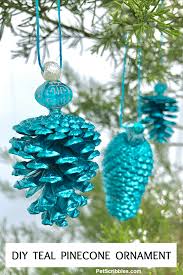 For outdoor decorations pinecones are the natural solution. How To Make A Stunning Teal Pinecone Ornament Garden Sanity By Pet Scribbles