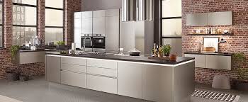 Another main attraction of this german kitchen design is the angular wooden stools. German Kitchen Showroom German Kitchen Inox Nobilia Kitchen
