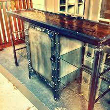 We are going for an industrial/steampunk look in our new apartment and were trying to find the perfect tv stand. Steampunk Tv Stand Steampunk Tv Stand Diy Dresser Makeover Tv Stand