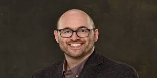 Local college professor shares business success