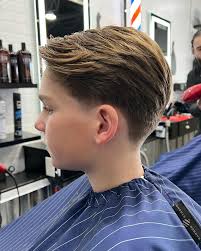 Classic taper and clean up for this Gentleman. Respected the crown and kept  the wave for easy maintenance.